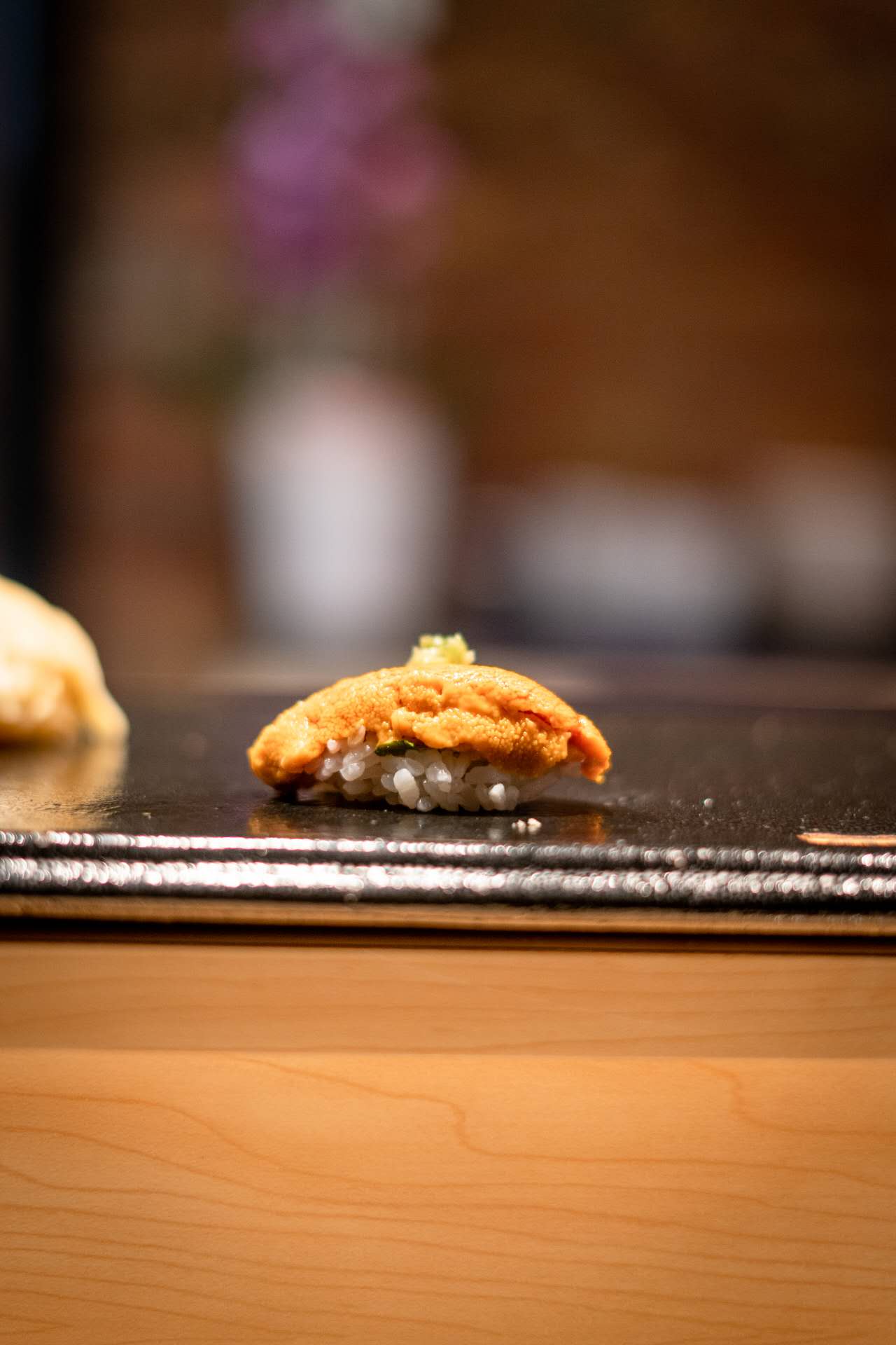 Fresh uni nigiri served at the omakase counter