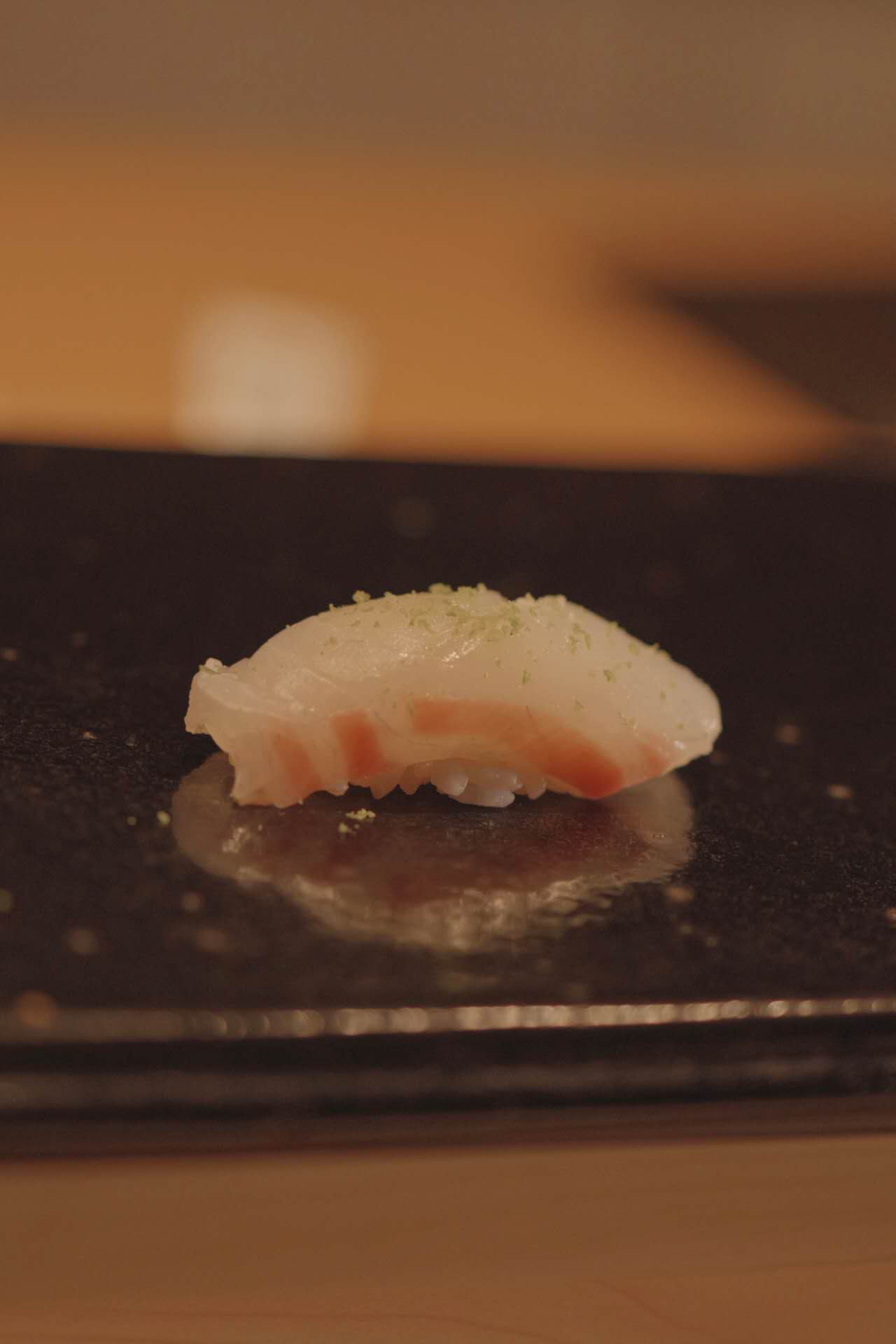 White fish nigiri with yuzu